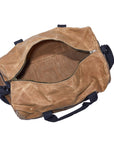 Tan waxed canvas duffel bag unzipped, showing the open main compartment
