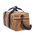 End of the tan waxed canvas duffel bag with a zip pocket and shoulder strap