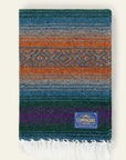 Falsa blanket in teal, rust, blue and purple stripes with a rust diamond band
