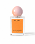 Dolly perfume bottle with a pink sphere cap and orange label on a white background