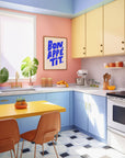 Add charm to your kitchen with this Bon Appétit art print. Hand-lettered in bold blue on a white background, it's a fresh and playful addition to any space.