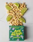 Cashew Lime Crisp Date Better packaging with cashews and lime slices on a white background