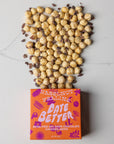Box of 'Date Better' chocolate-covered dates with hazelnuts on top