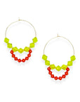 Joyful, flirty, and full of energy—these Small Spark Hoops are a burst of personality. A radiant heart-shaped crystal takes center stage, framed by watermelon and chartreuse tones that feel like summer bottled up. A scattering of dangling crystals adds playful movement, making these hoops perfect for anyone who loves to stand out and shine.