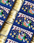 Fishwife Limited-Edition Matchbox. Cozy winter vibes by the fire with art by Danny “Danbo” Miller. Light up your home, Fishwife-style!