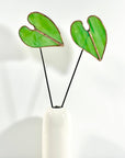 Bring a pop of color and artistry to your home with this handcrafted stained glass elephant ear by Samara Designs Studio. Each piece is made by hand using carefully selected stained glass, cut and assembled with care to create a lasting botanical accent that will never wilt or fade.