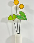 Bring a pop of color and artistry to your home with this handcrafted stained glass elephant ear by Samara Designs Studio. Each piece is made by hand using carefully selected stained glass, cut and assembled with care to create a lasting botanical accent that will never wilt or fade.