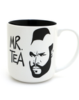 White mug with black interior, black and white graphic of a face, and 'MR. TEA' text on a white background