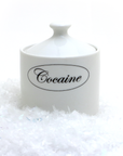 White container labeled 'Cocaine' on a white background