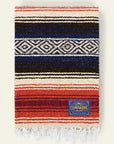 Falsa blanket in navy, black, cream and red stripes with a white diamond band