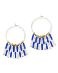 Crafted from durable 14k gold-filled or sterling silver and meticulously adorned with hand-beaded Japanese glass beads, the Kaleid Fringe Hoops are the ultimate expression of modern personality. These statement earrings don't just complement your look; they become the focal point of your ensemble.