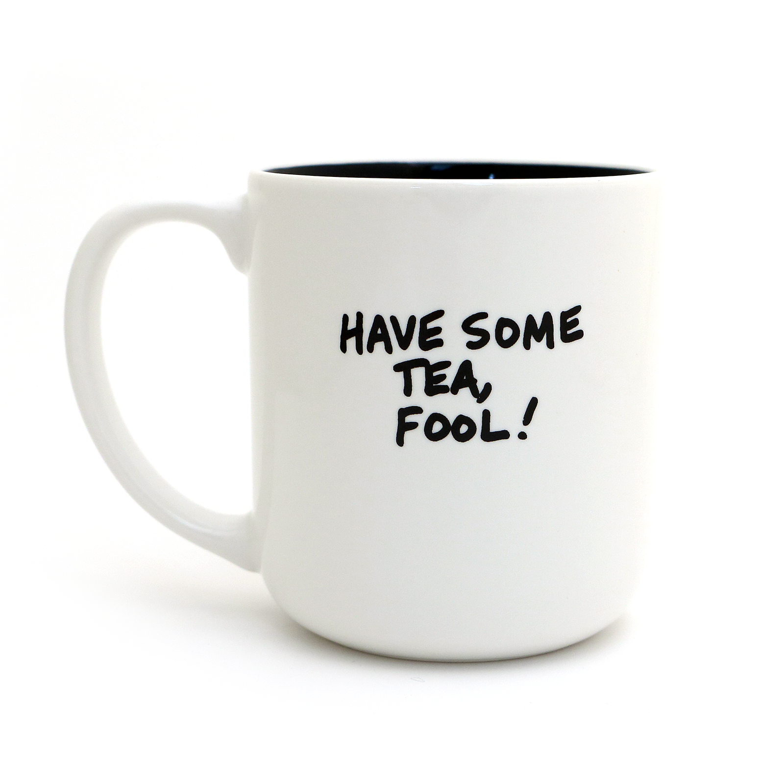 White mug with black interior and text 'HAVE SOME TEA, FOOL!' on a white background