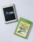Forty Ways to Know a Tree and a dark starry companion book on a light background