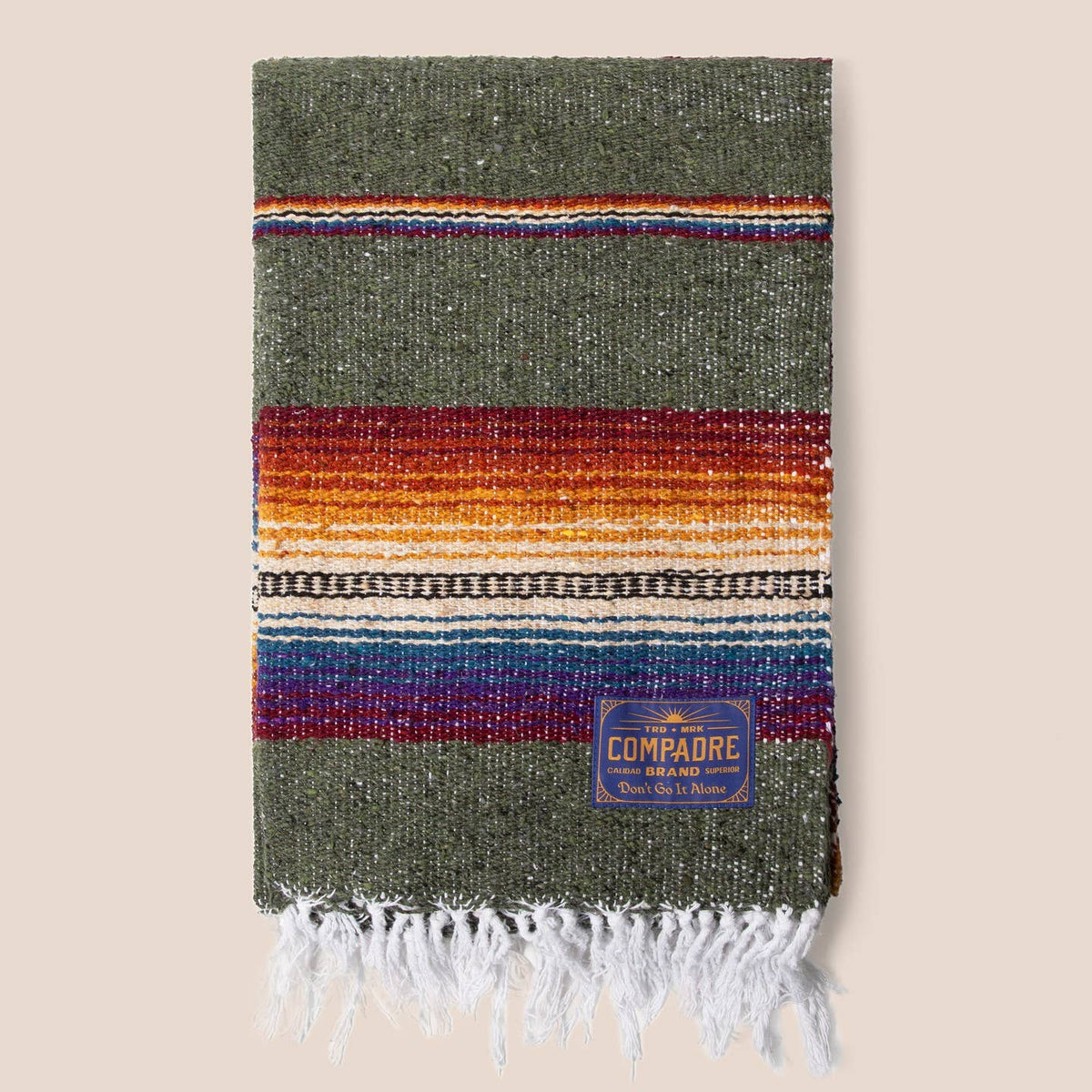 Olive green sarape blanket with a band of red, orange, purple and blue stripes