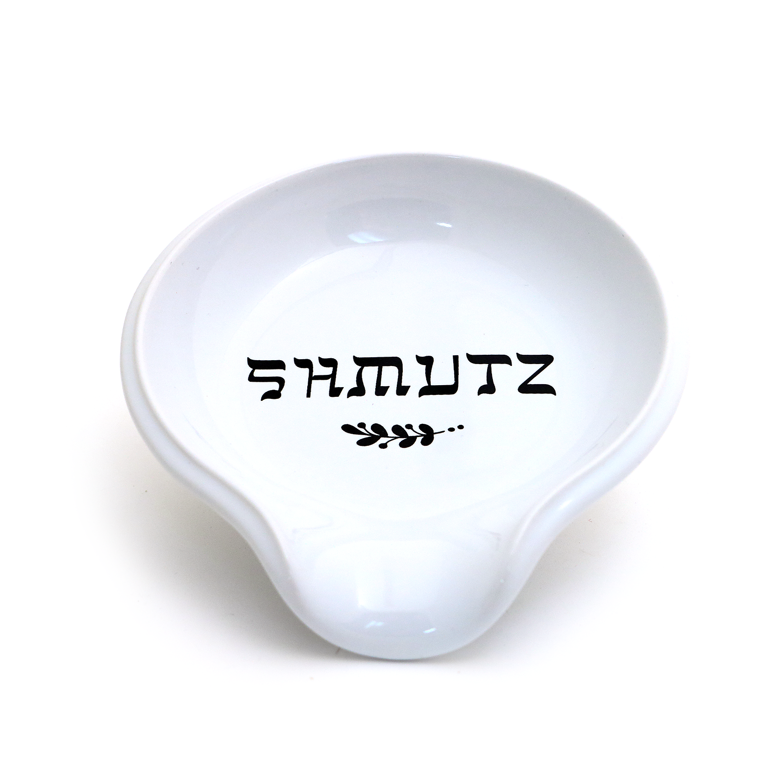 White ceramic dish with 'SHMUTZ' text on a white background
