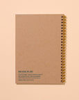 Unlock your inner child with this delightfully wiggly worm notebook. Featuring a quirky worm pattern on a letterpress printed cover, this A5 spiral notebook is just the right size for lists, doodles, and garden daydreams.
