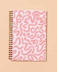 Unlock your inner child with this delightfully wiggly worm notebook. Featuring a quirky worm pattern on a letterpress printed cover, this A5 spiral notebook is just the right size for lists, doodles, and garden daydreams.
