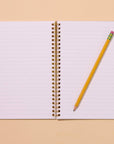 Unlock your inner child with this delightfully wiggly worm notebook. Featuring a quirky worm pattern on a letterpress printed cover, this A5 spiral notebook is just the right size for lists, doodles, and garden daydreams.