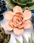 Bring everlasting blooms into your space with ceramic flowers—beautiful, handmade pieces that add a touch of nature-inspired charm without the upkeep. Each flower comes packaged in a lovely gift box and features a keyhole back, so you can display it on a wall or style it on a tabletop. Perfect for creating a blooming statement that never fades.
