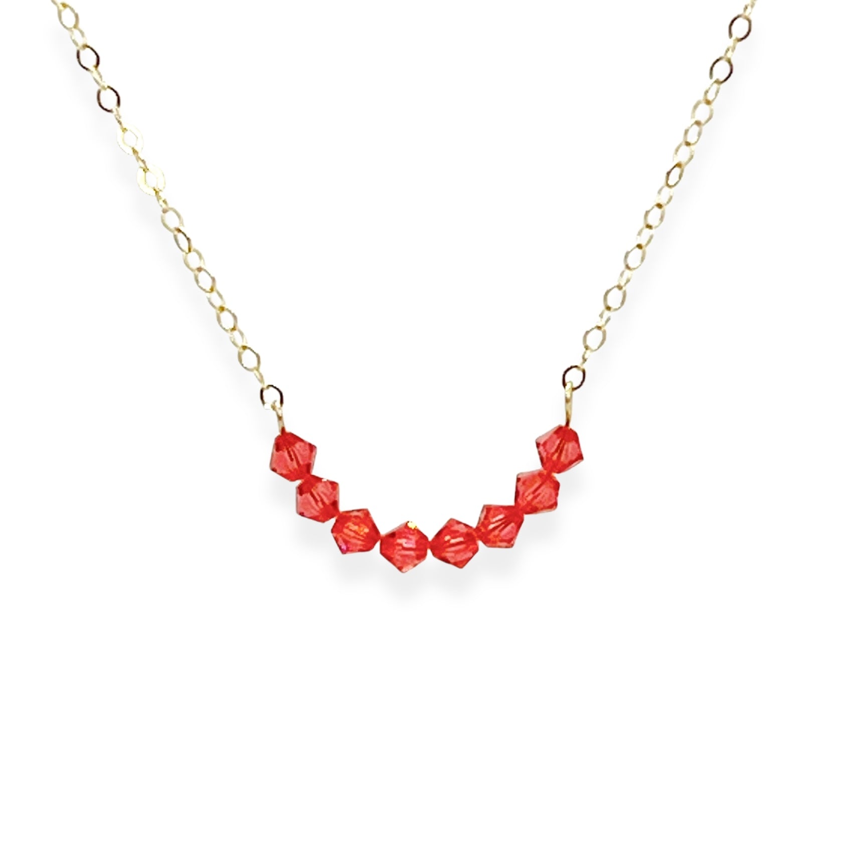 The Crystal Arc Necklace brings a playful twist to a minimal silhouette. Featuring a smooth, curved, colorful crystal arc, it’s designed to rest beautifully along your neckline. This piece adds an effortless pop of color that’s perfect for layering or wearing solo when you want a simple statement.