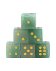 Roll with a little extra magic. These crystal dice are carved from natural gemstones and finished with engraved gold numbers, turning a classic game piece into something truly special. Each one features its own unique colors and patterns, so no two are exactly alike. Whether you’re upgrading game night or picking out a thoughtful gift, this is a small detail that makes a big impression. Available in Indian Agate, Clear Quartz, Tiger Eye, and Green Aventurine.