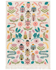 Add charm and protection to your kitchen with the Amulet Embroidered Dishtowel. Featuring insects, reptiles, flowers, and feathers in vibrant hues with playful tassels.