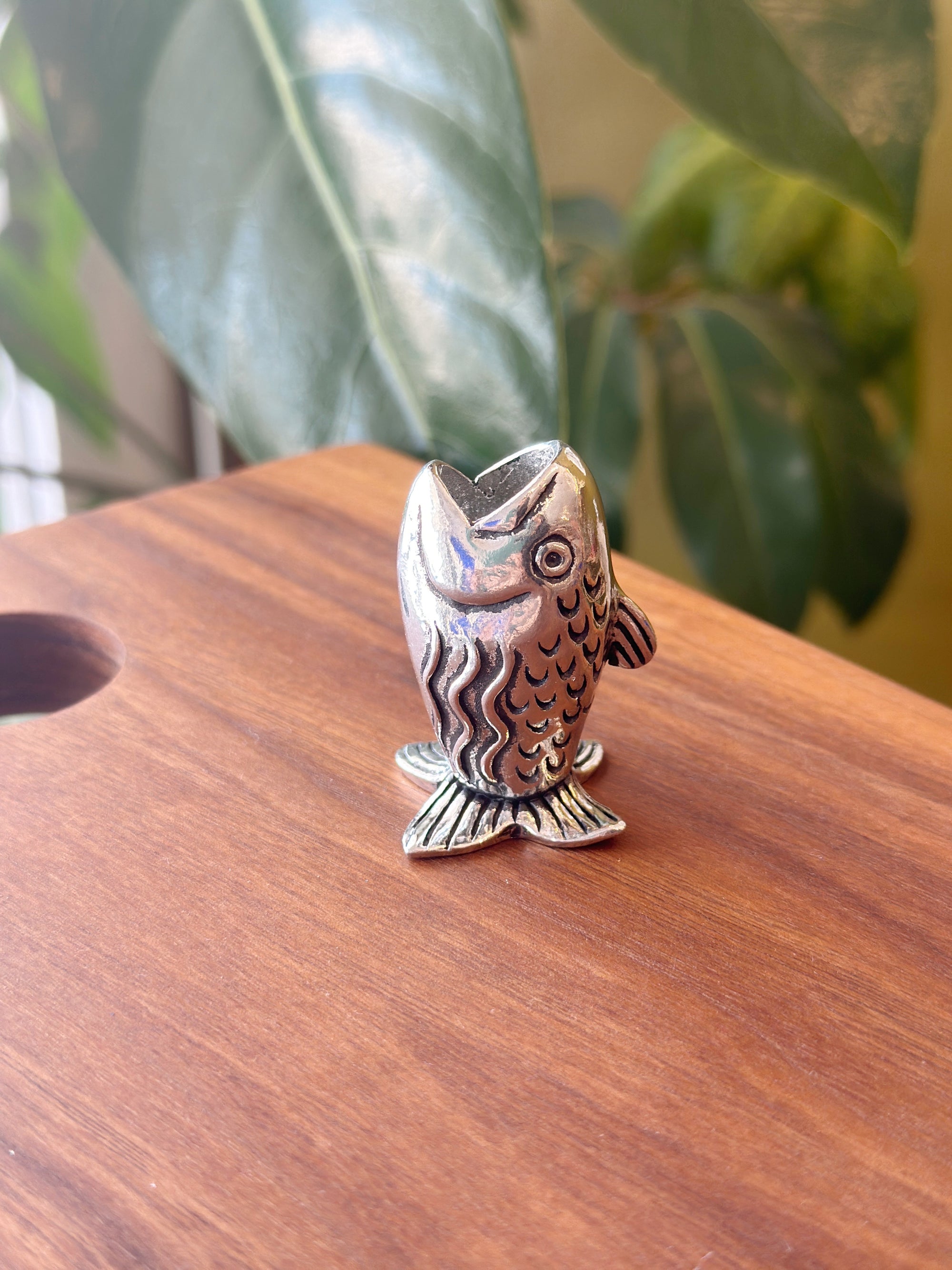 Keep your toothpicks within reach with a playful Fish Toothpick Holder. It's the perfect gift for the avid fisherman in your life or someone that just enjoys a cute table accessory. It's not just for toothpicks; it makes a great match holder too! Fine hand-crafted pewter, made in Canada.