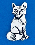 Meet your new favorite pocket companion! Keep it in your bag or use it to decorate your home. On one side, a beautifully detailed fox sits in quiet observation, while the other side cheekily reads 'Crafty.'

Fine hand-crafted pewter, made in Canada.