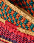 Add these bright, handcrafted baskets to your table, shelf or closet - the uses are limited only by your imagination! Gorgeously handwoven from locally sourced veta vera grass, the utilitarian design features an assortment of vibrant colors. Each one is woven while wet and can be re-shaped by adding water, perfect for the kitchen and bath! Durable and washable, these baskets are a beautiful and unique addition to any decor.&nbsp;