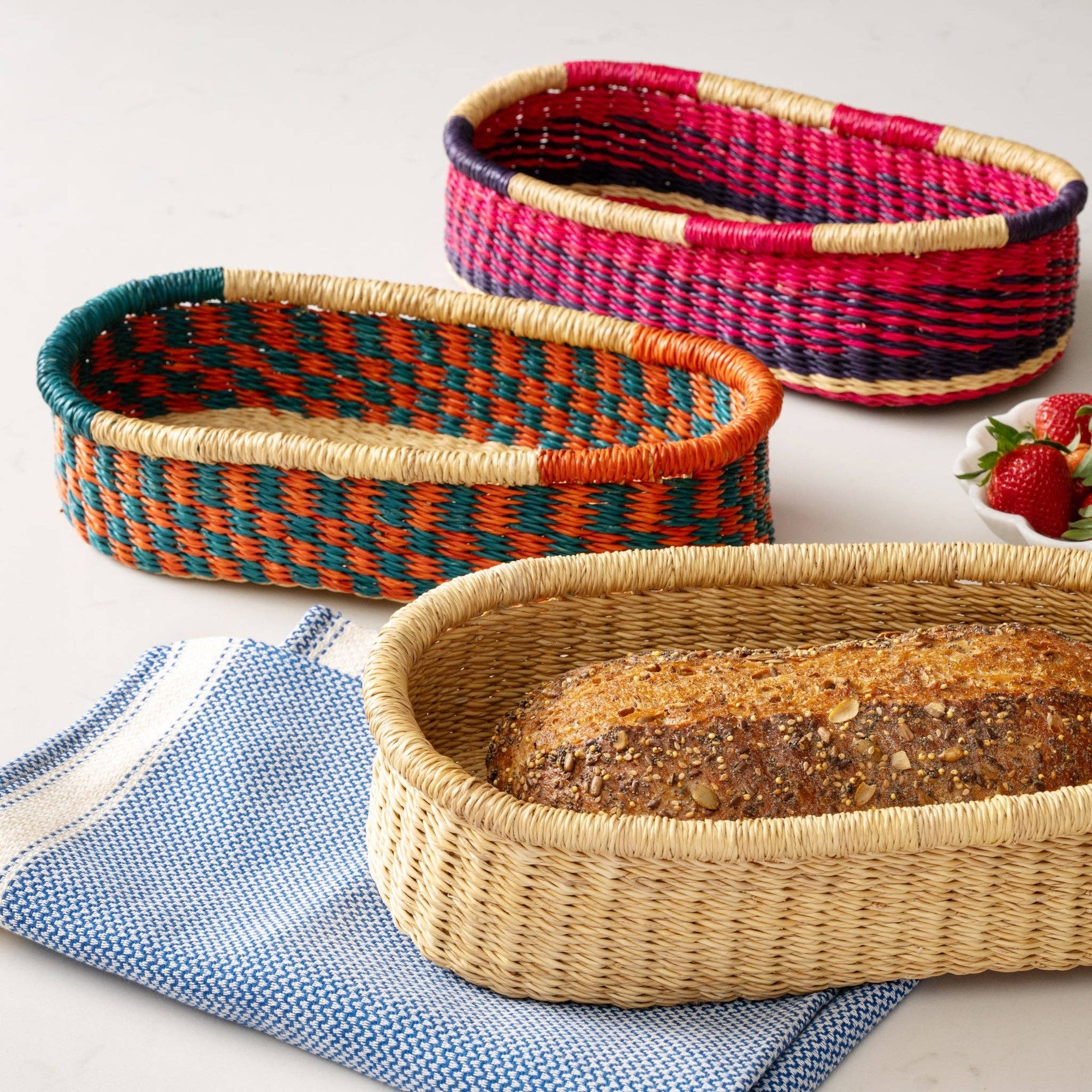 Add these bright, handcrafted baskets to your table, shelf or closet - the uses are limited only by your imagination! Gorgeously handwoven from locally sourced veta vera grass, the utilitarian design features an assortment of vibrant colors. Each one is woven while wet and can be re-shaped by adding water, perfect for the kitchen and bath! Durable and washable, these baskets are a beautiful and unique addition to any decor.&amp;nbsp;