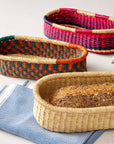 Add these bright, handcrafted baskets to your table, shelf or closet - the uses are limited only by your imagination! Gorgeously handwoven from locally sourced veta vera grass, the utilitarian design features an assortment of vibrant colors. Each one is woven while wet and can be re-shaped by adding water, perfect for the kitchen and bath! Durable and washable, these baskets are a beautiful and unique addition to any decor.&nbsp;