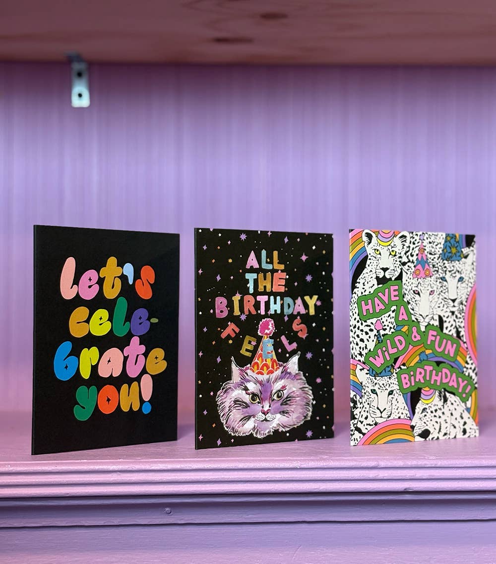 This moody, star-studded birthday cat card is giving all the feels — literally. A grumpy-glam party cat in a birthday hat against a glittery black background makes this the perfect funny cat birthday card for anyone who celebrates hard but maybe isn't totally thrilled about getting older.