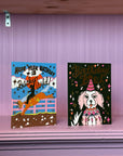 Two birthday cards on a purple surface with a pink curtain background.