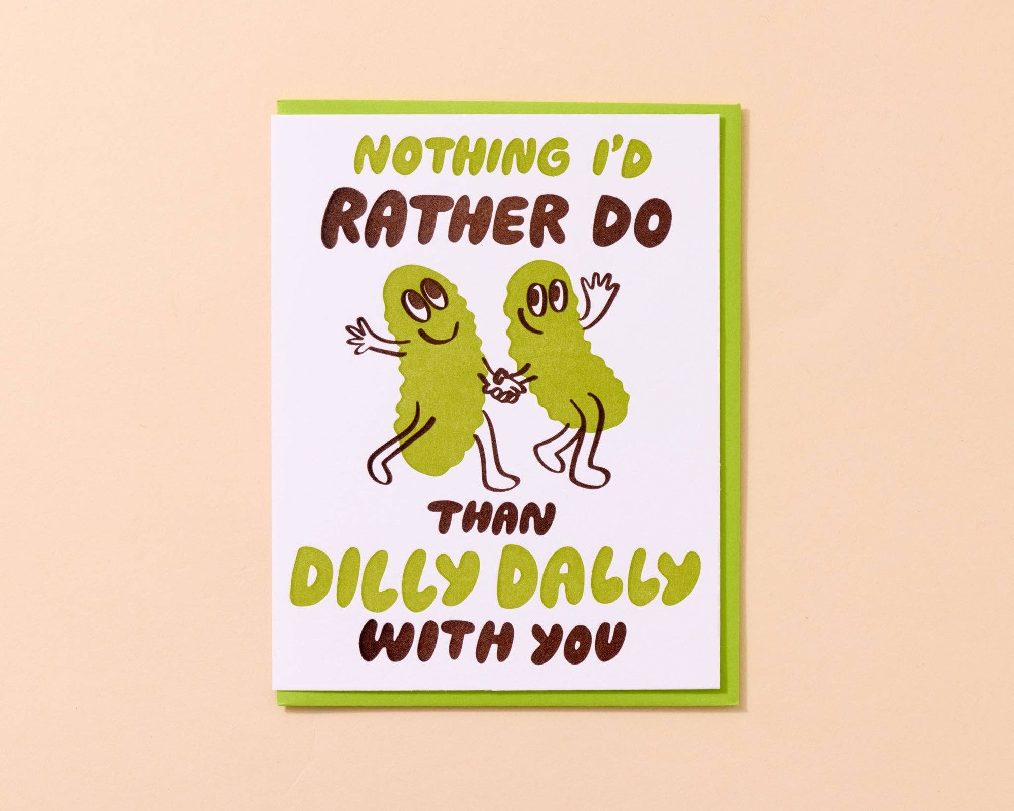 Card with cartoon characters and humorous text on a beige background