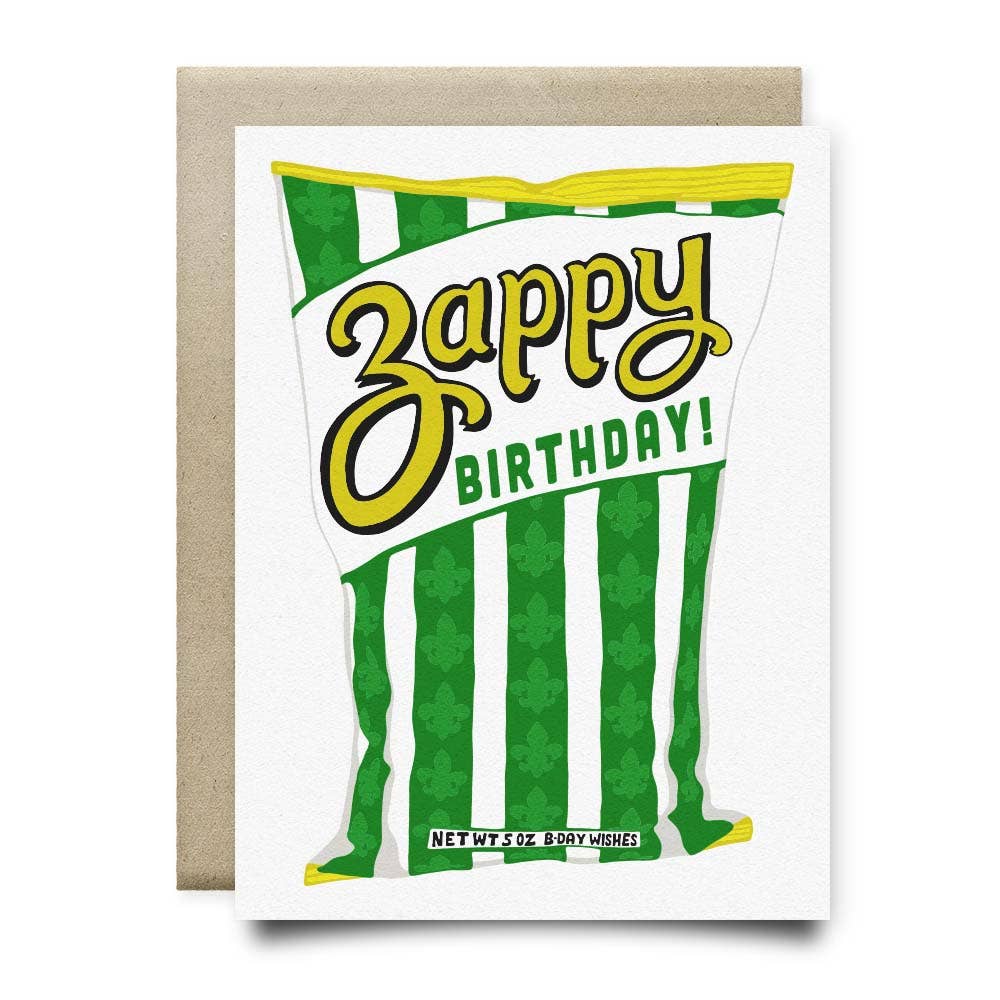 Zest up your birthday wishes with this Zappy Birthday greeting card! Made in Houston, Texas, this card features a bag of Zapp's Chips in the flavor Cajun Dill Gator-Tators with the phrase "Zappy Birthday!" Blank inside, perfect for adding your own unique touch. Created by real hands in Houston, Texas.
