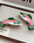 Make a playful, outdoorsy statement with this rainbow trout-shaped hair claw clip. Crafted from smooth acetate, it’s lightweight yet secure, adding a whimsical, nature-inspired touch to your look. Perfect for anglers, animal lovers, or anyone who enjoys a quirky, eye-catching accessory.