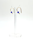 Simple and expressive, the Horseshoe Pull-Through Hoops are a fresh take on everyday earrings. Their petite arc shape hugs the lobe just right, while a single crystal adds a glint of light and intention. Minimal yet full of meaning, these are the earrings you’ll reach for again and again.