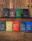 Collection of incense cone packages on a wooden shelf