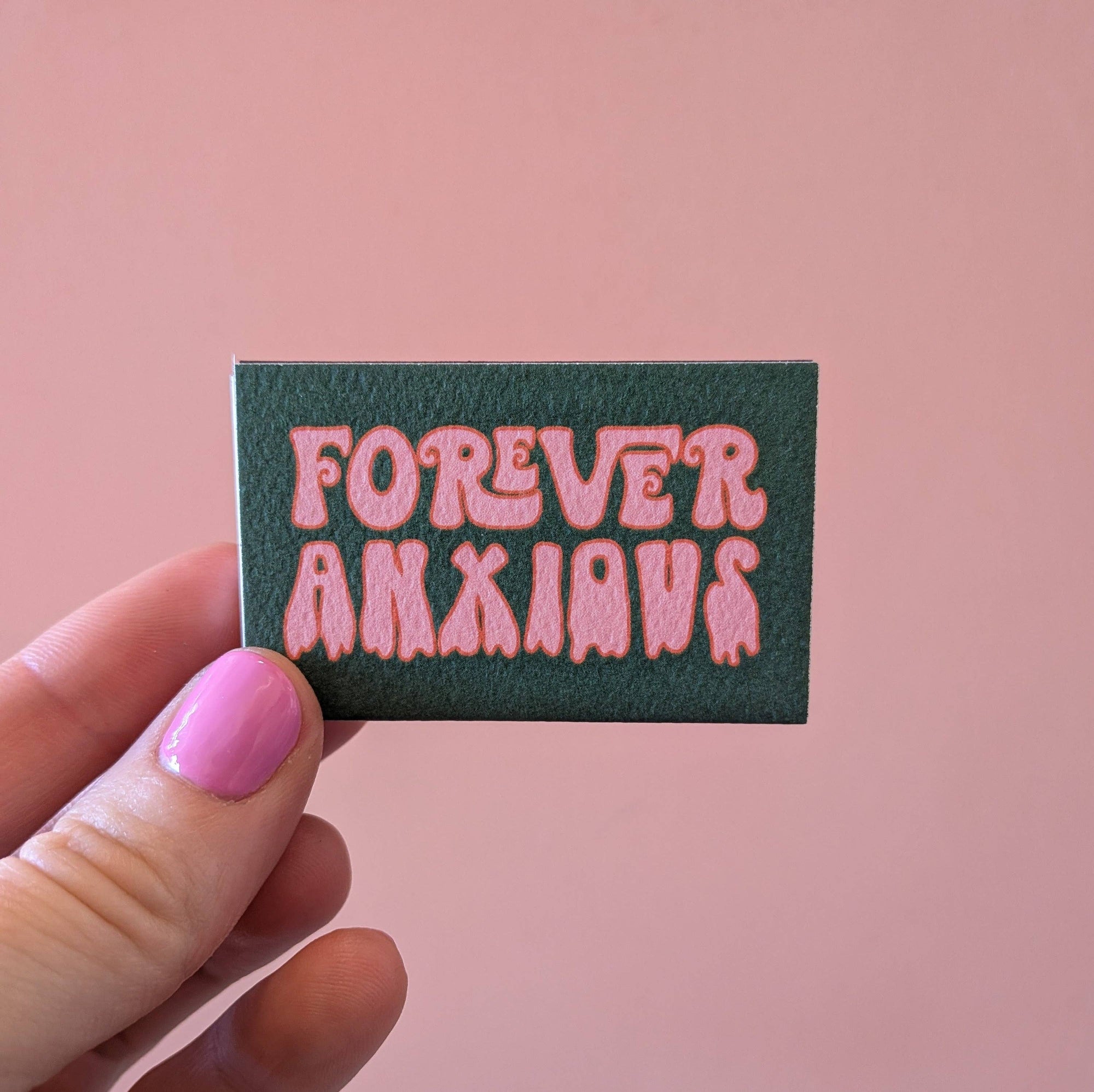 For the chronically overthinking, perpetually over-prepared, and deeply self-aware. With bold bubble letters and drippy dread, it’s anxiety—but make it groovy. Equal parts relatable and tongue-in-cheek, this match set makes the perfect gift for your most anxious friend…or yourself.