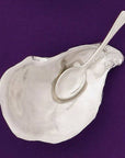 This salt cellar, shaped like an oyster shell, will add a dash of style and whimsy to your table. Includes a miniature spoon for perfectly sprinkling spices. You'll want to keep this salt cellar out on your table full-time. The days of salt being banished to the spice cabinet is behind you! Fine hand-crafted pewter, made in Canada.