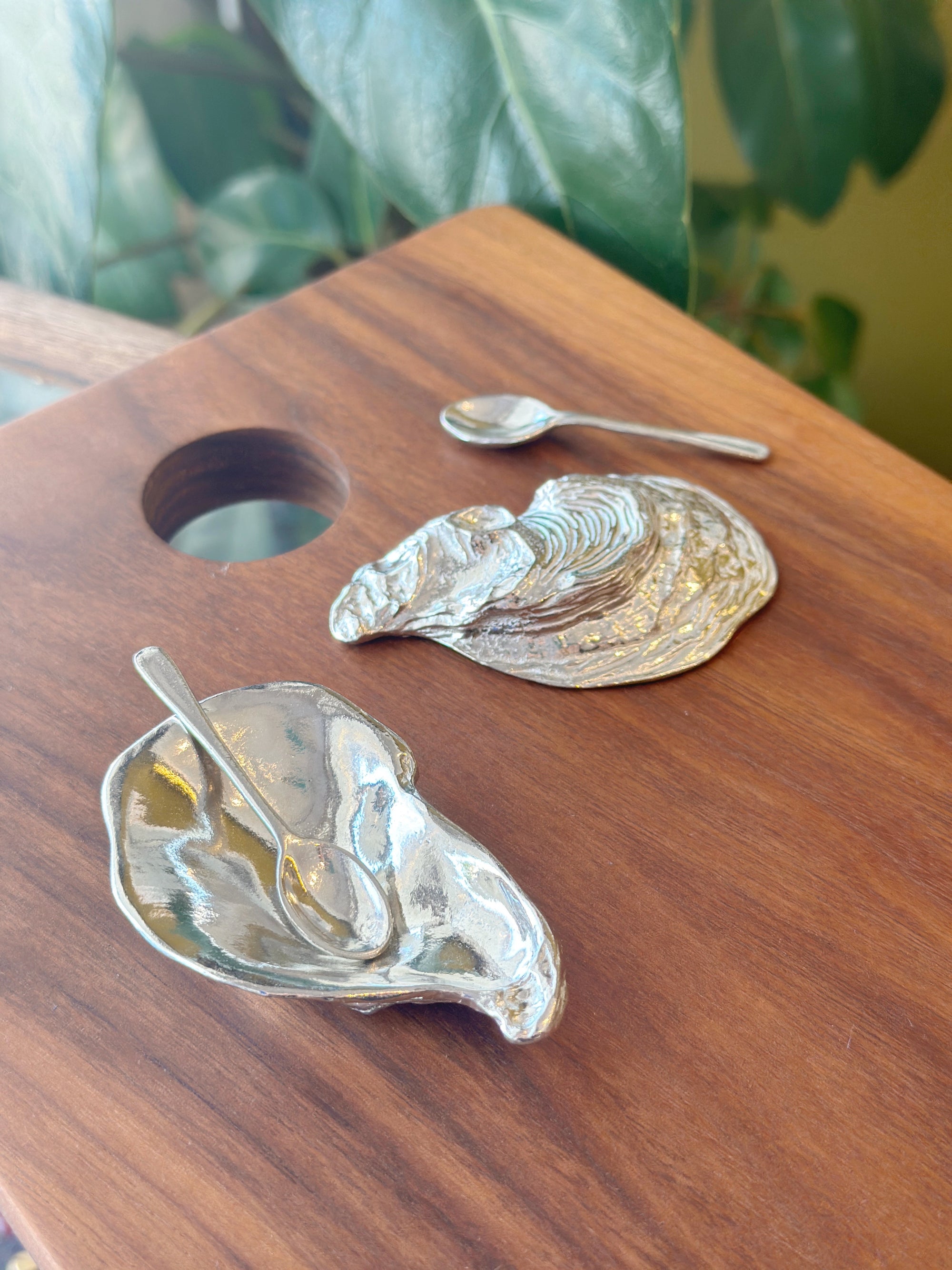 This salt cellar, shaped like an oyster shell, will add a dash of style and whimsy to your table. Includes a miniature spoon for perfectly sprinkling spices. You'll want to keep this salt cellar out on your table full-time. The days of salt being banished to the spice cabinet is behind you! Fine hand-crafted pewter, made in Canada.