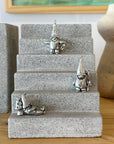 Whimsical 2 in pewter gnome, handcrafted in Canada! With 3 styles—lantern, stick, or mushroom nap—he’s perfect for adding character to your garden or shelf.