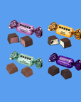 Assorted Maveve candies on a blue background