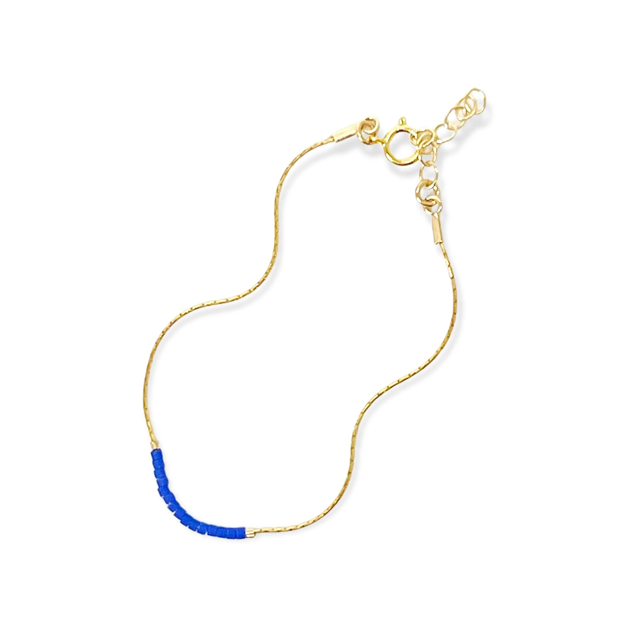 Pick your perfect color.

The Septima Bracelet is made to order in your choice of color from a wide selection of solid hues. It’s an easy way to create something just for you.

Each bracelet is handcrafted with beautiful Japanese glass beads strung on an adjustable 14k gold-filled chain. Choose a color that matches your team, wedding, wardrobe, or mood. The Septima Bracelet is simple, elegant, and uniquely yours.