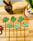 Bring a pop of color and artistry to your home with this handcrafted stained glass elephant ear by Samara Designs Studio. Each piece is made by hand using carefully selected stained glass, cut and assembled with care to create a lasting botanical accent that will never wilt or fade.