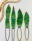 Handmade stained glass snake plant with 4 sculpted leaves. A cat-friendly, zero-maintenance houseplant alternative. Perfect for colorful home decor.