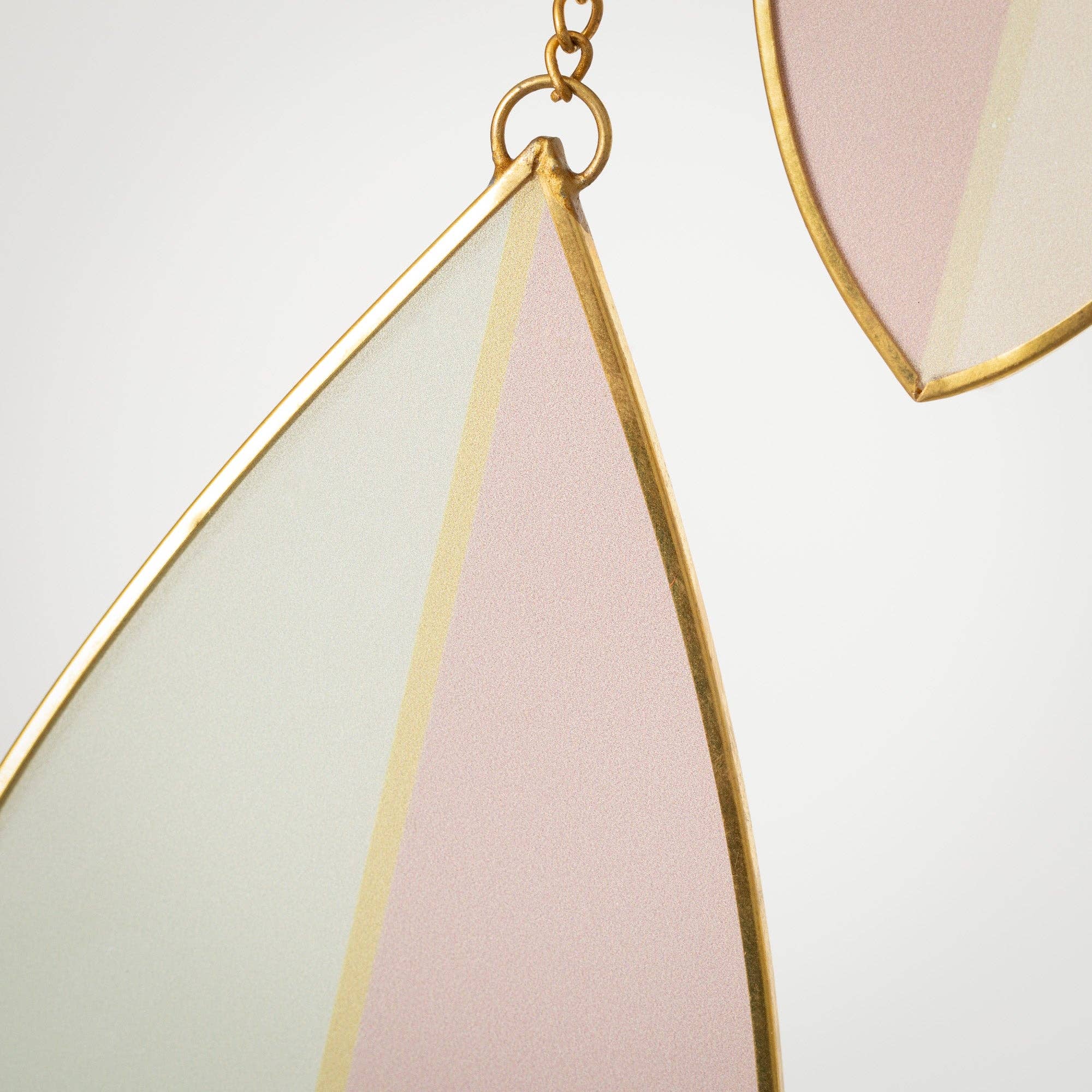 Brighten any room with this pink &amp; green stained glass suncatcher with copper accents—elegant, modern, and perfect as a gift.