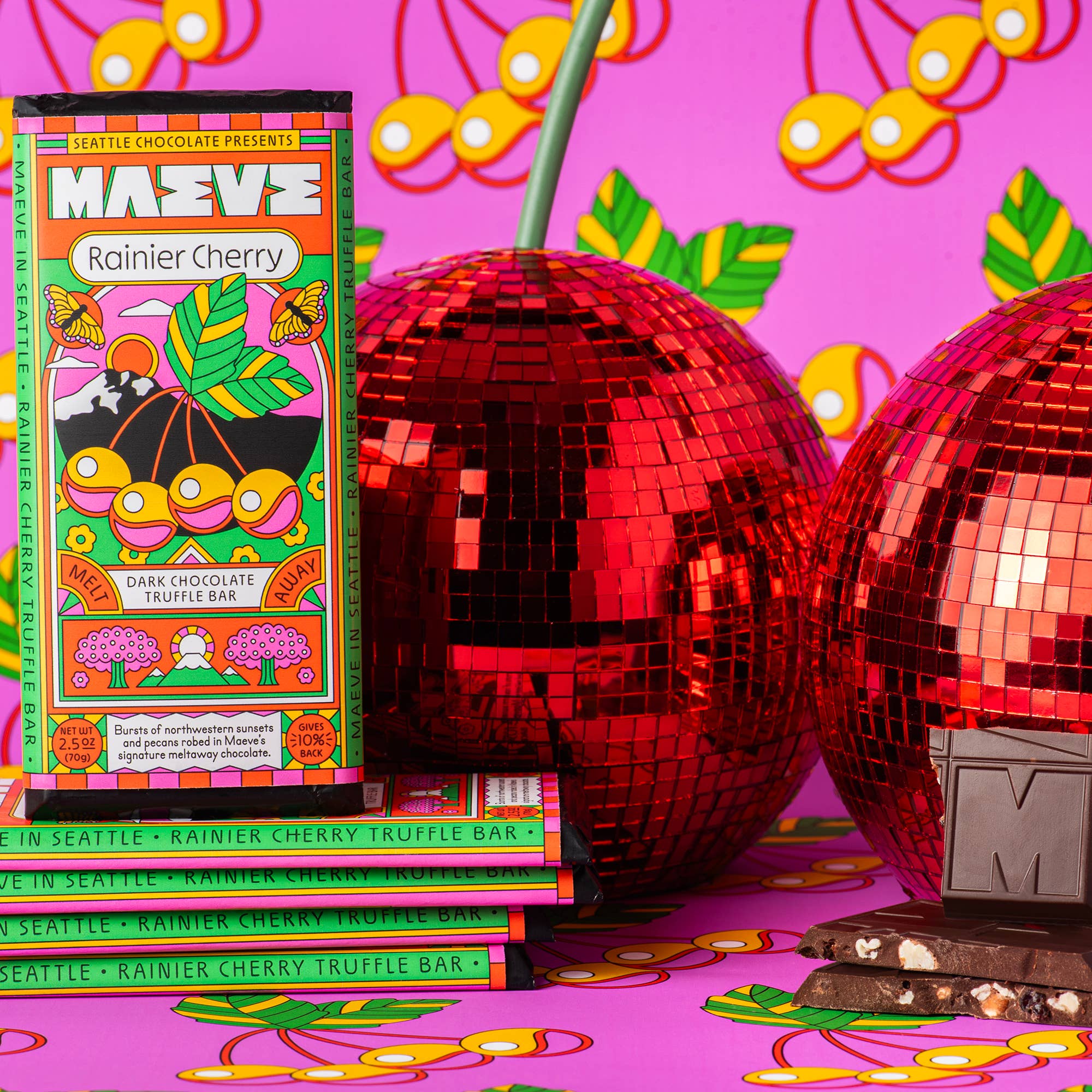 Colorful Seattle Chocolate Rainier Cherry truffle bar packaging with disco balls on a vibrant background
