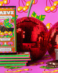 Colorful Seattle Chocolate Rainier Cherry truffle bar packaging with disco balls on a vibrant background