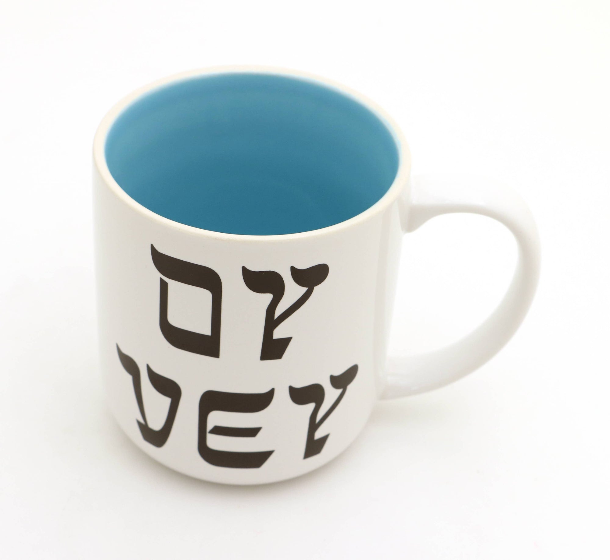 White mug with blue interior and black text on a white background